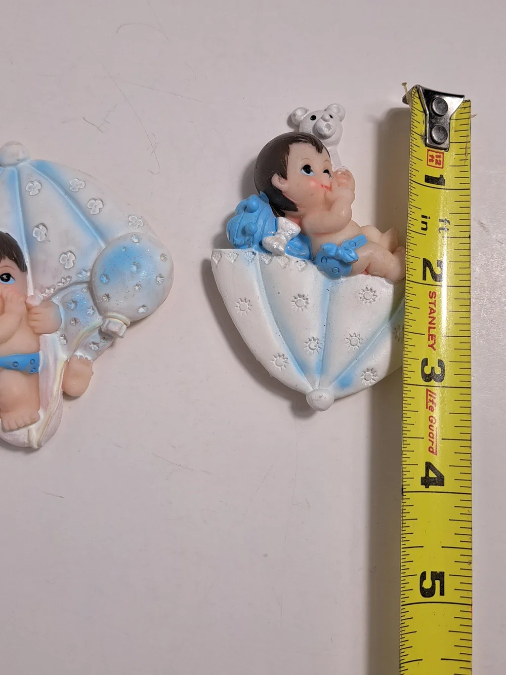 Blue Baby Ceramic Figurines with a Magnet on the back. Great for Baby Shower